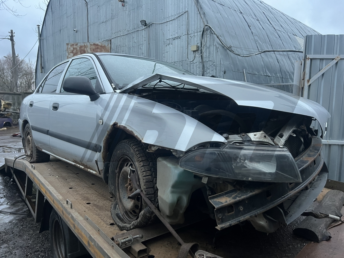 Разборка Mitsubishi Carisma 2003 г.в. с пробегом 250 000 км