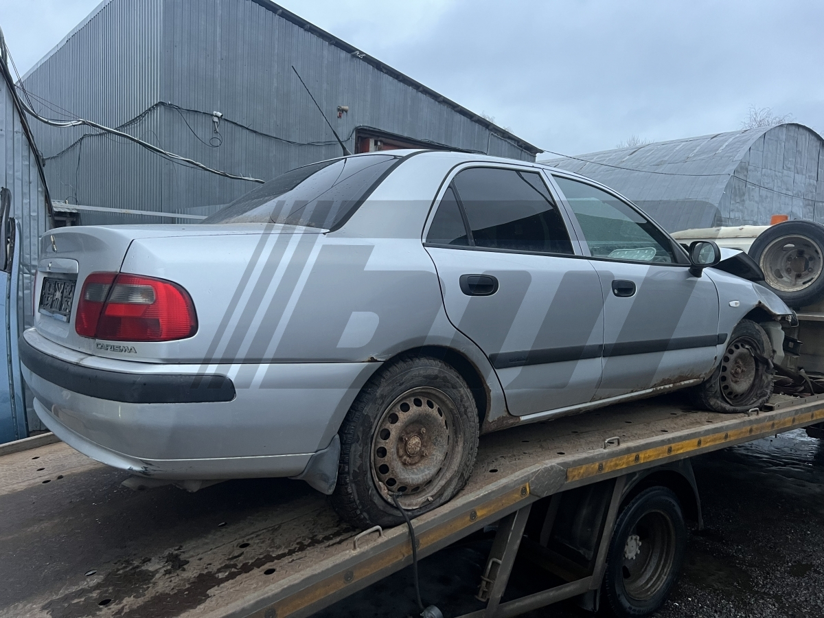 Разборка Mitsubishi Carisma 2003 г.в. с пробегом 250 000 км