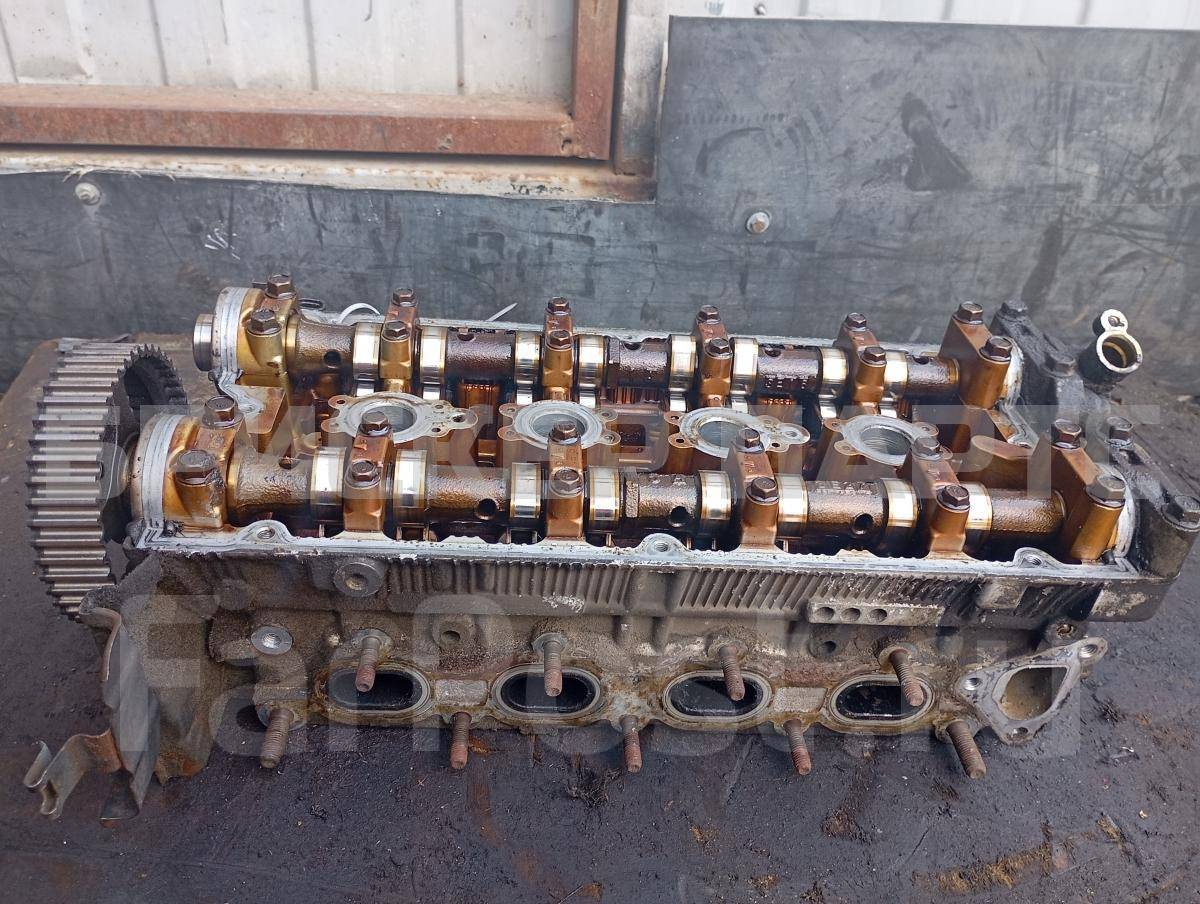 Головка блока двигателя (ГБЦ) на Митсубиси Кольт 6 поколение (Z20) MR984425