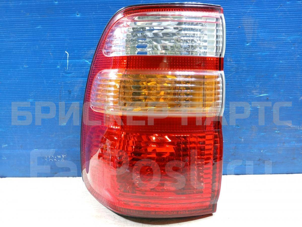 Фонарь задний наружный левый на Тойота Лэнд Крузер 100 8156060480
