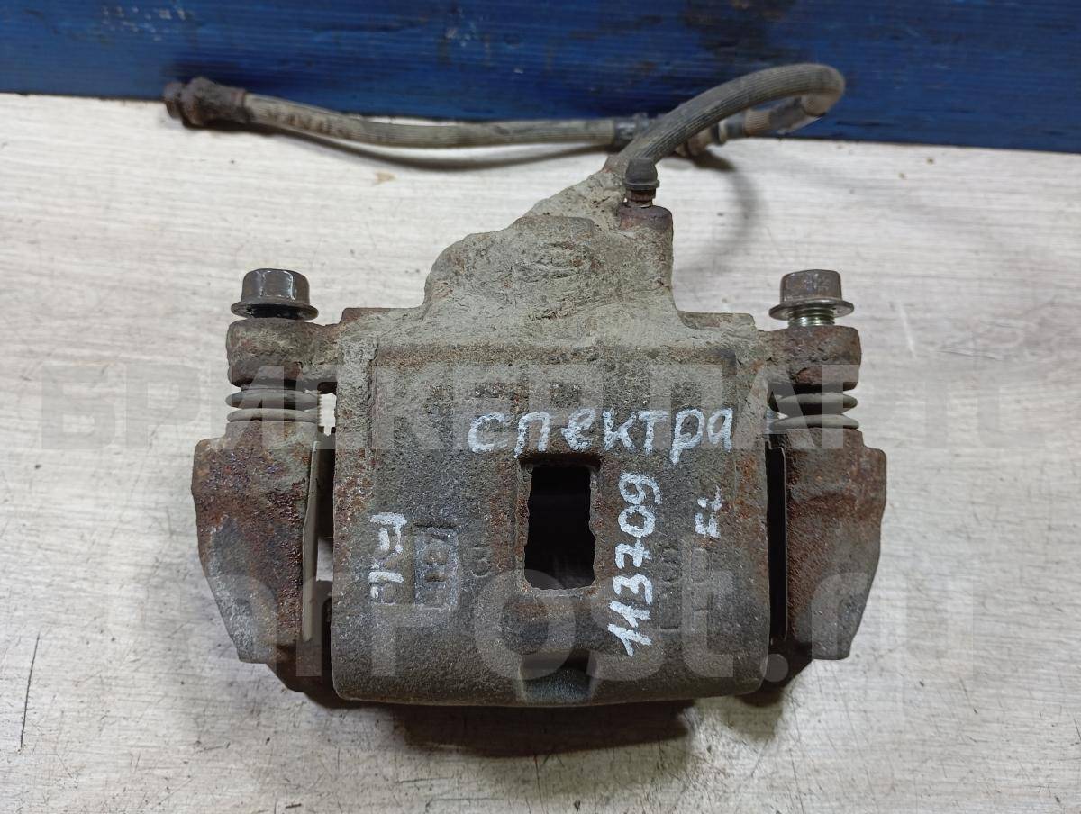 Суппорт, тормозной механизм передний левый для Киа Спектра 1 поколение SD