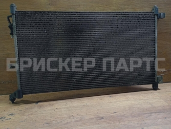 Радиатор кондиционера (конденсер) на Ниссан Микра 3 поколение K12 92100EL00A