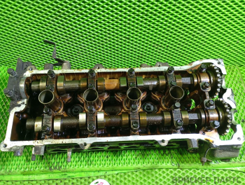Головка блока двигателя (ГБЦ мотора) для Ниссан Марч 2 поколение K11 1104041B04