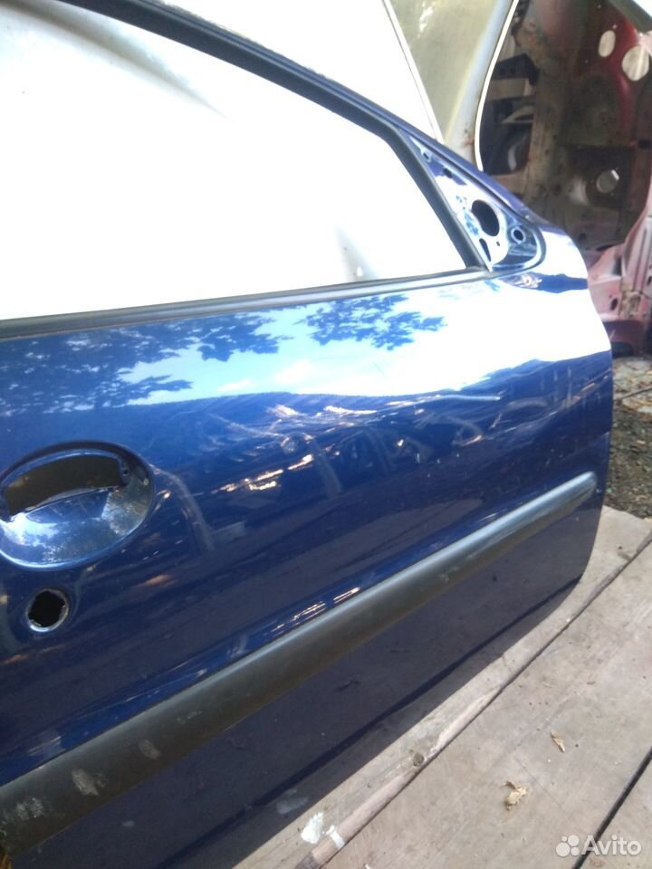 Дверь передняя правая на Пежо 206