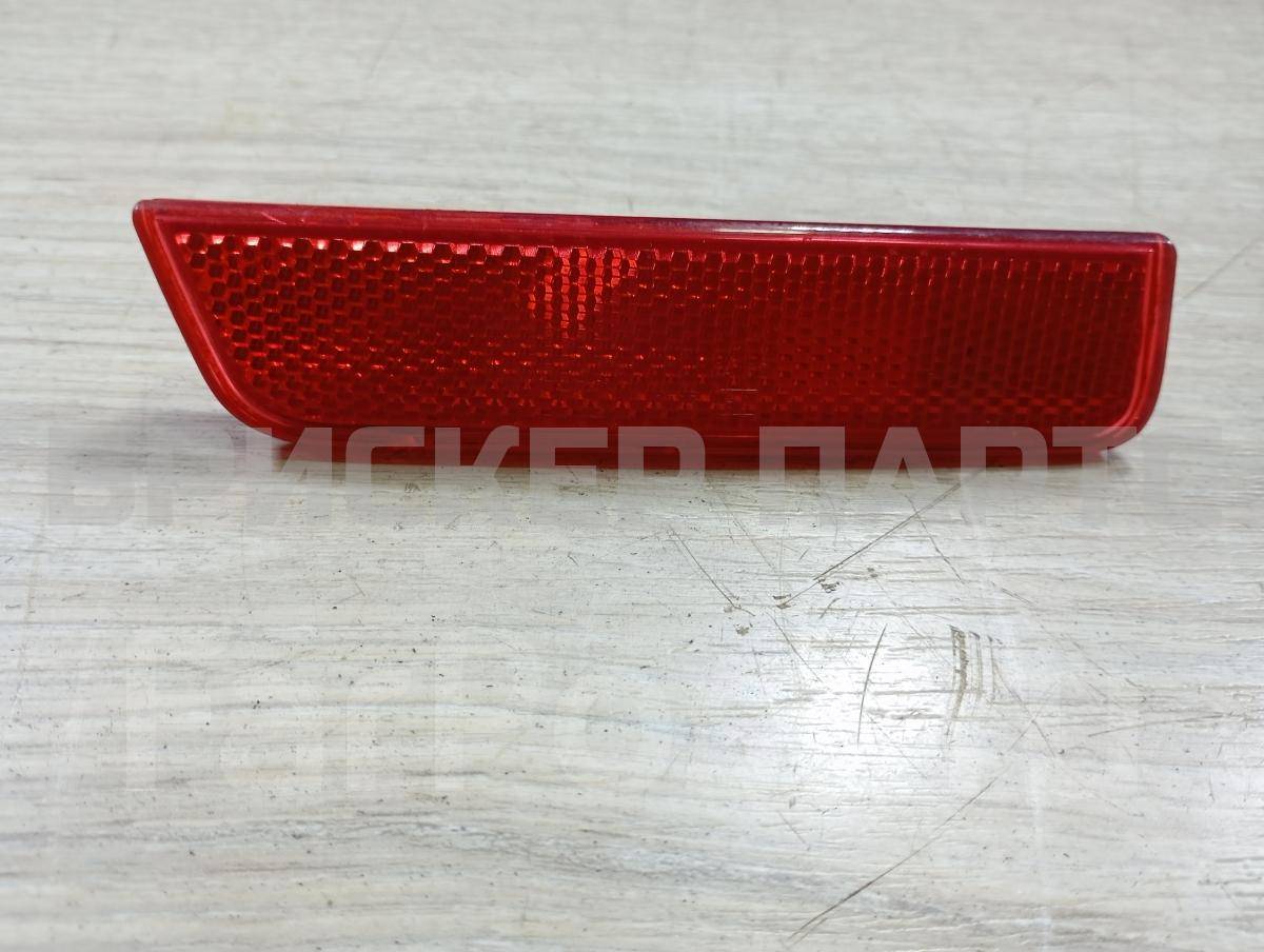 Катафот (отражатель, габарит) задний левый в бампер для Рено Сандеро 2 поколение 265654344R