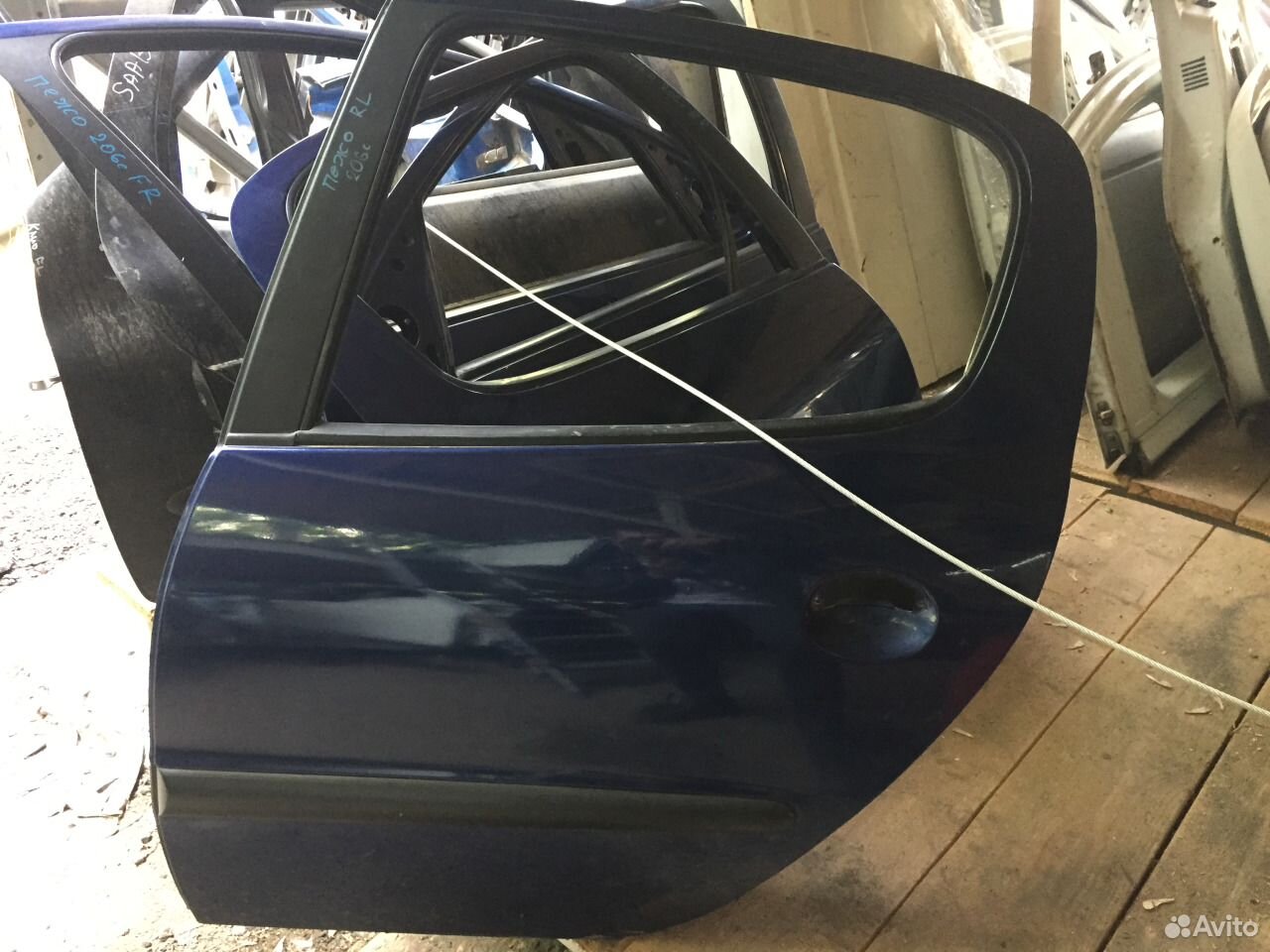 Дверь задняя левая на Пежо 206