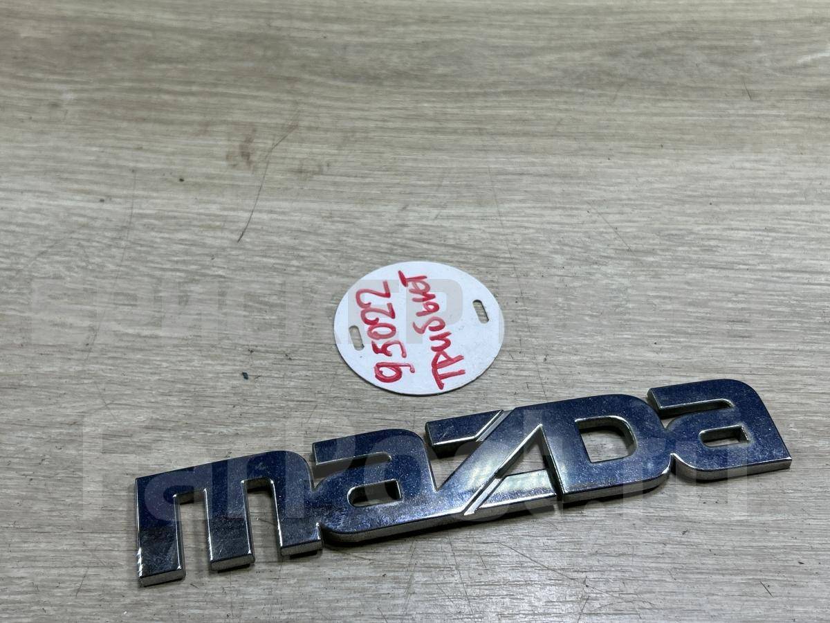 Эмблема, надпись, значок для Мазда Трибьют 1 серия EP E11051711