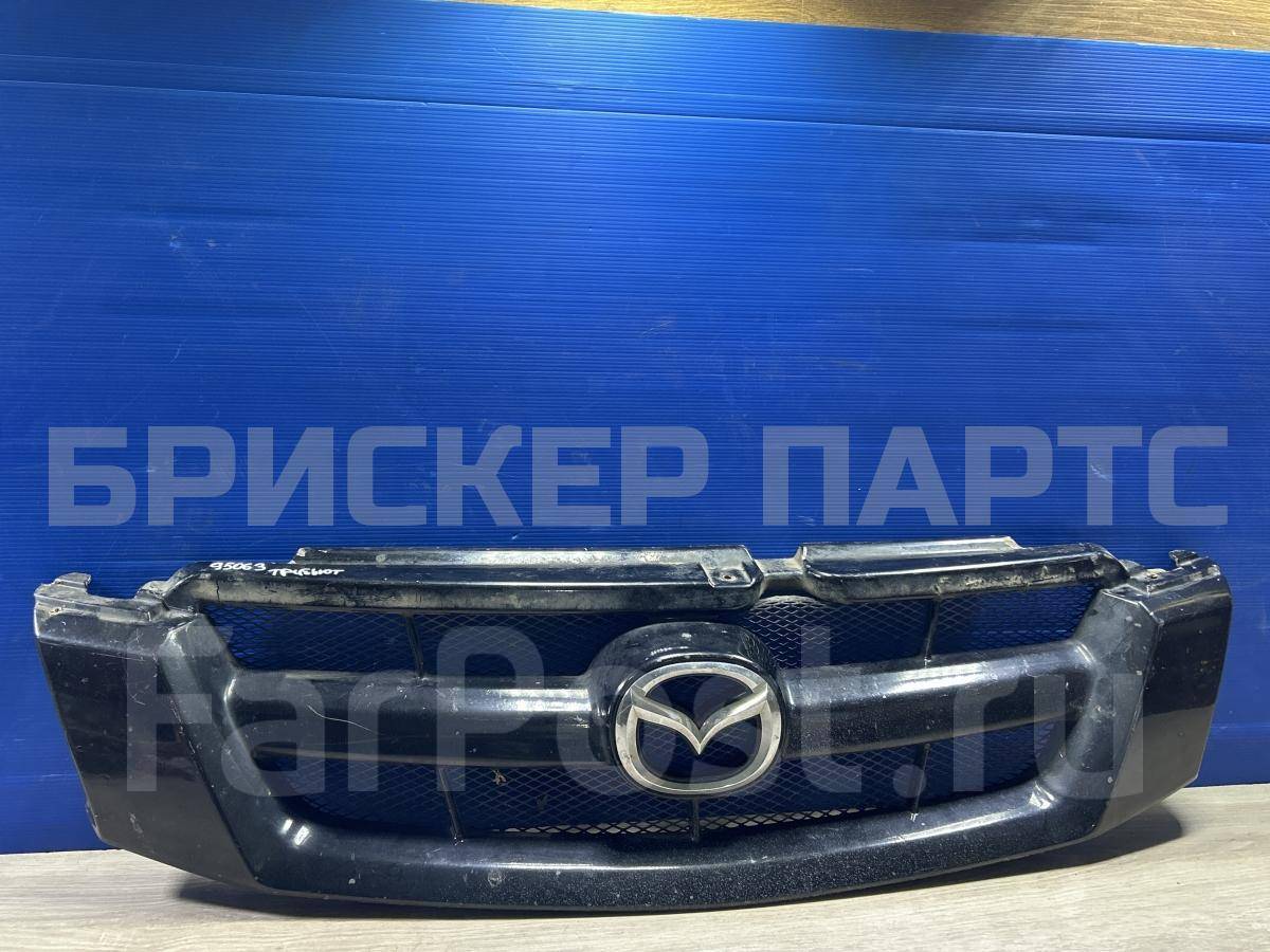 Решетка радиатора на Мазда Трибьют 1 серия EP 5T248150BAW