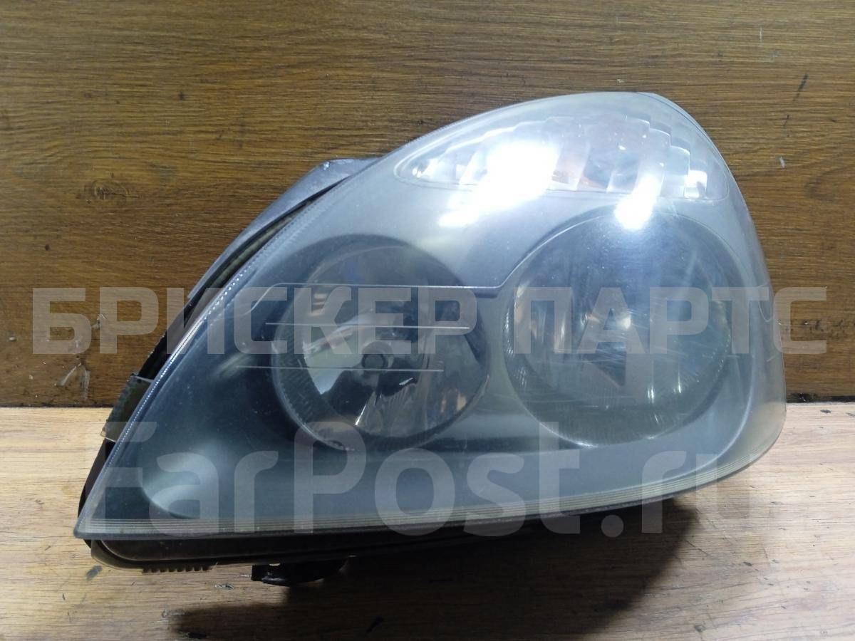 Фара левая на Рено Симбол 1 поколение 10020748