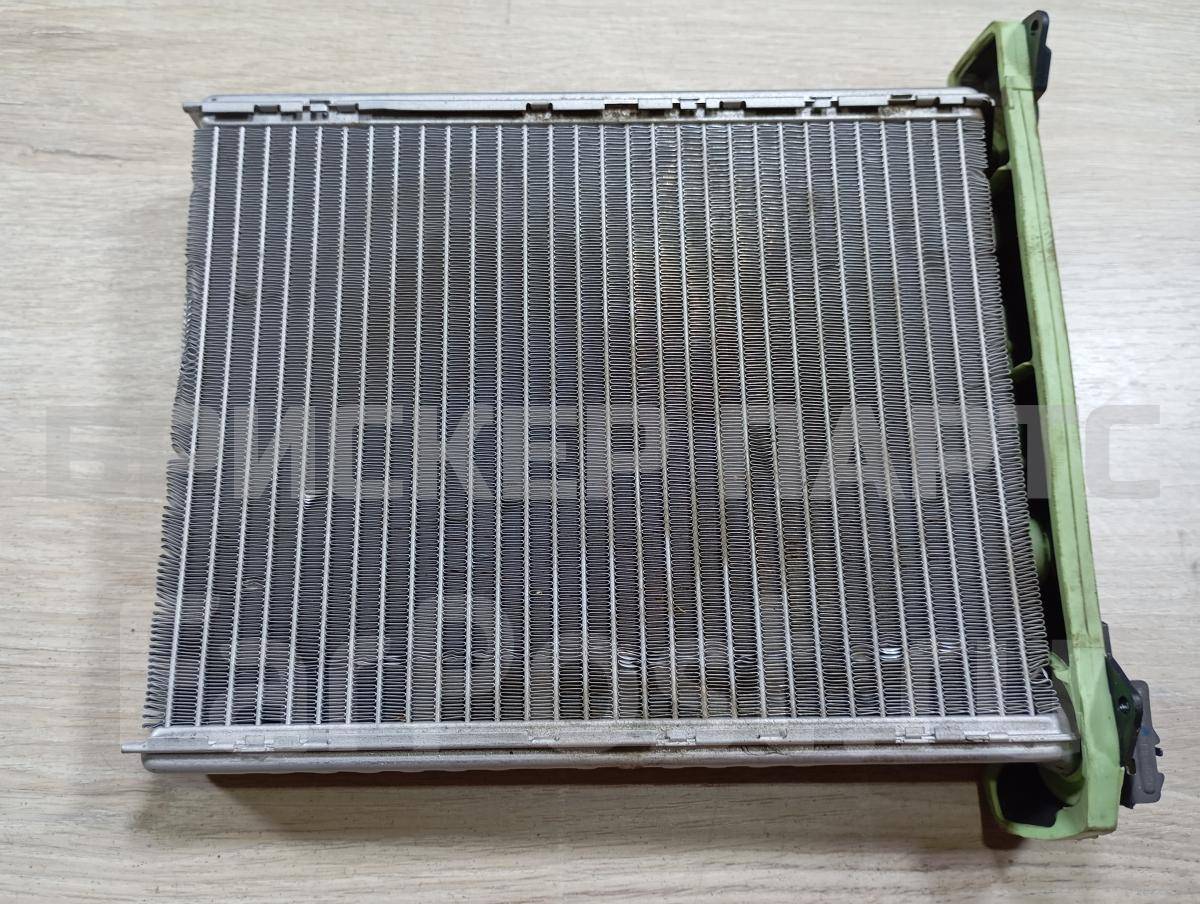 Радиатор отопителя на Пежо 408 I T1014497T