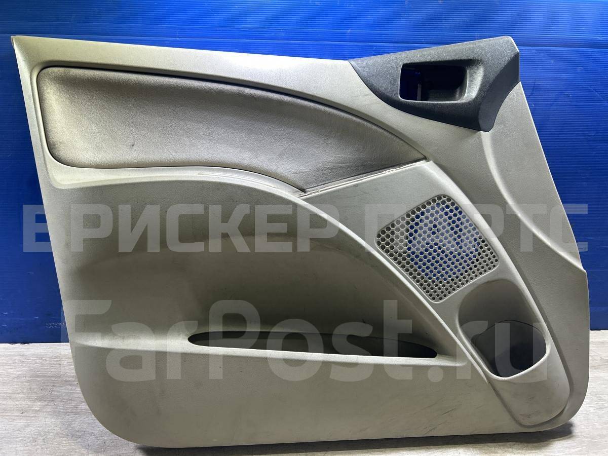 Обшивка водительской двери (обивка) передней левой на Митсубиси Кольт VI (Z20) MR951211